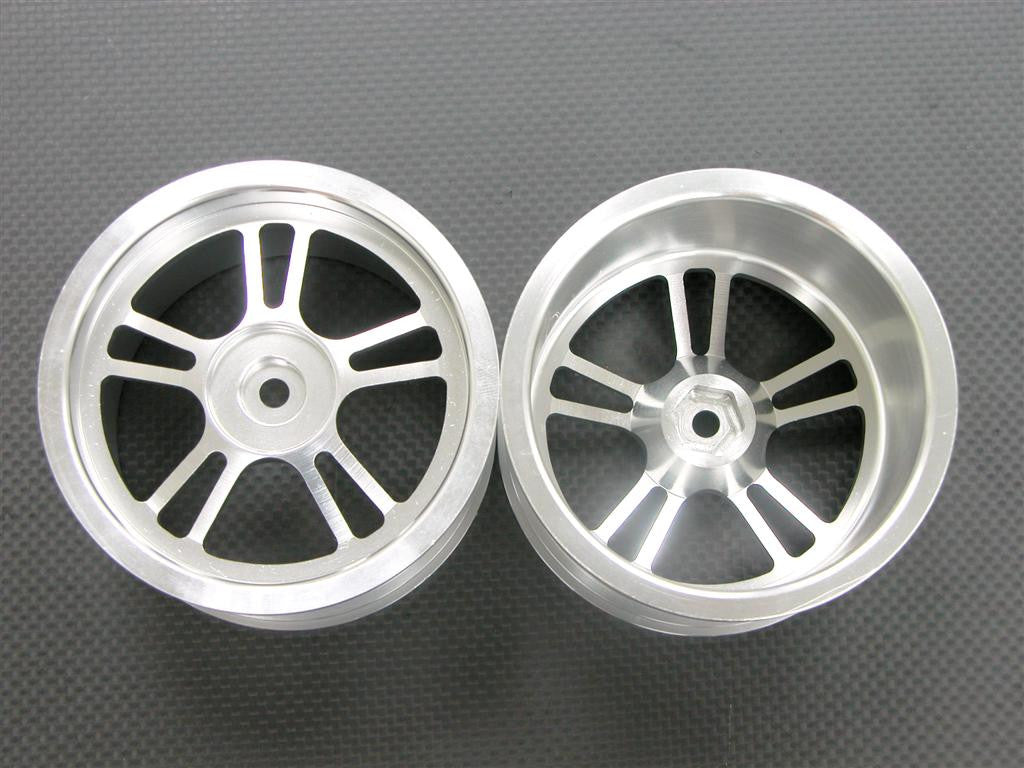 Traxxas Revo Aluminum Front/Rear Rims (5 Star) - 1Pr Silver